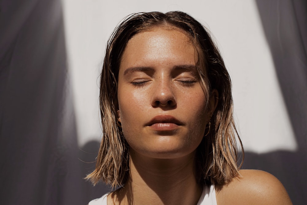 Natural daylight portrait showing bare, healthy skin